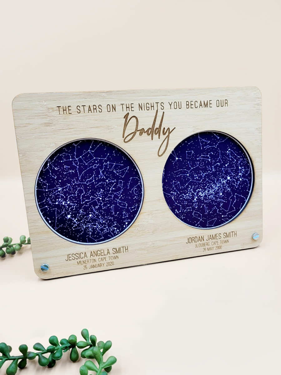Personalized wooden framed star map with dual constellation designs, commemorating special moments for "Daddy."