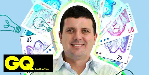 Man with a smile surrounded by colorful banknotes and GQ South Africa logo.