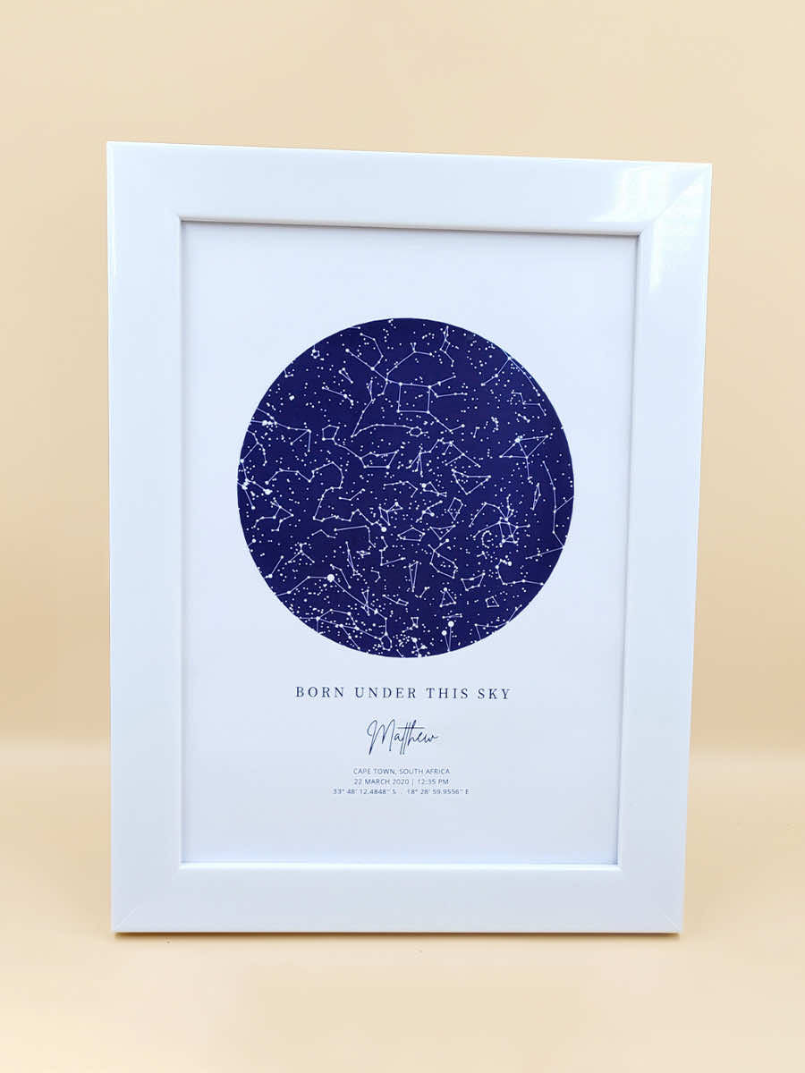 Personalised star map in white frame, titled 'Born Under This Sky', displaying a custom night sky for a unique date and location.