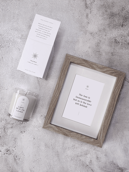 Inara gift box with soothing candle and framed message for comfort and hope during grieving.