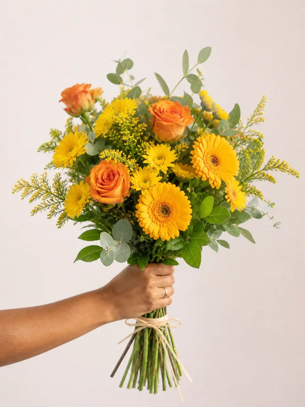 Orange rose and yellow gerbera hand-tied bouquet with chrysanthemums and eucalyptus