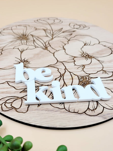 Personalised floral wooden plaque with 'be kind' text, engraved on oak veneer, perfect for gifting or home decor.