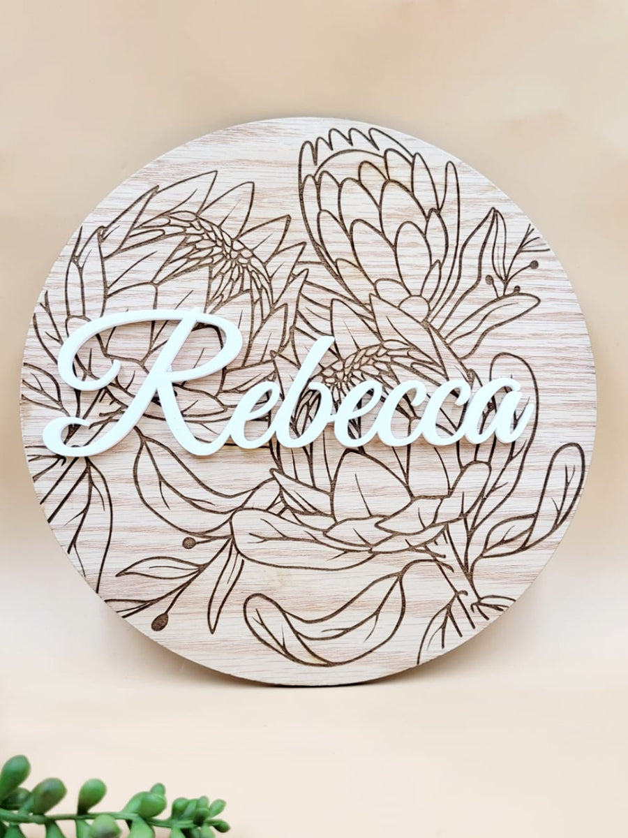 Personalised floral wooden plaque with "Rebecca" engraved, featuring intricate floral designs. Perfect heartfelt gift in oak veneer.