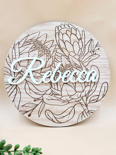 Personalised floral wooden plaque with "Rebecca" engraved, featuring intricate floral designs. Perfect heartfelt gift in oak veneer.