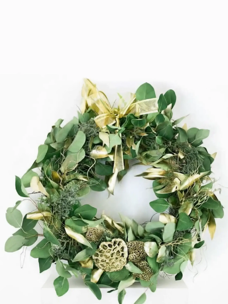 Green and gold Christmas wreath with eucalyptus, metallic gold leaves, cream flowers and gold ribbon - glamorous festive door decoration