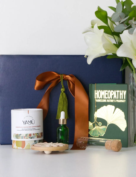 Herbal Homie Botanical Gift Set with healing herbs, tea blends, and wellness book for self-care and relaxation.