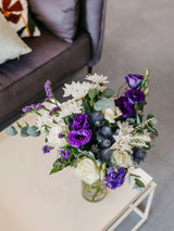 Bouquet of flowers with purple and white flowers on a table