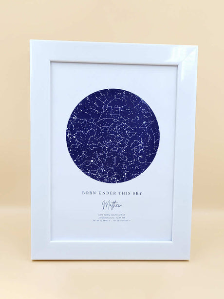Personalised star map in white frame, titled 'Born Under This Sky', displaying a custom night sky for a unique date and location.