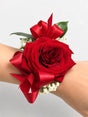 Wrist Corsage with Red Roses, Ribbon, Sprigs of Gypsophila and Greenery