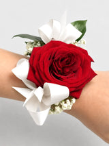 Wrist Corsage with Red Roses, Ribbon, Sprigs of Gypsophila and Greenery