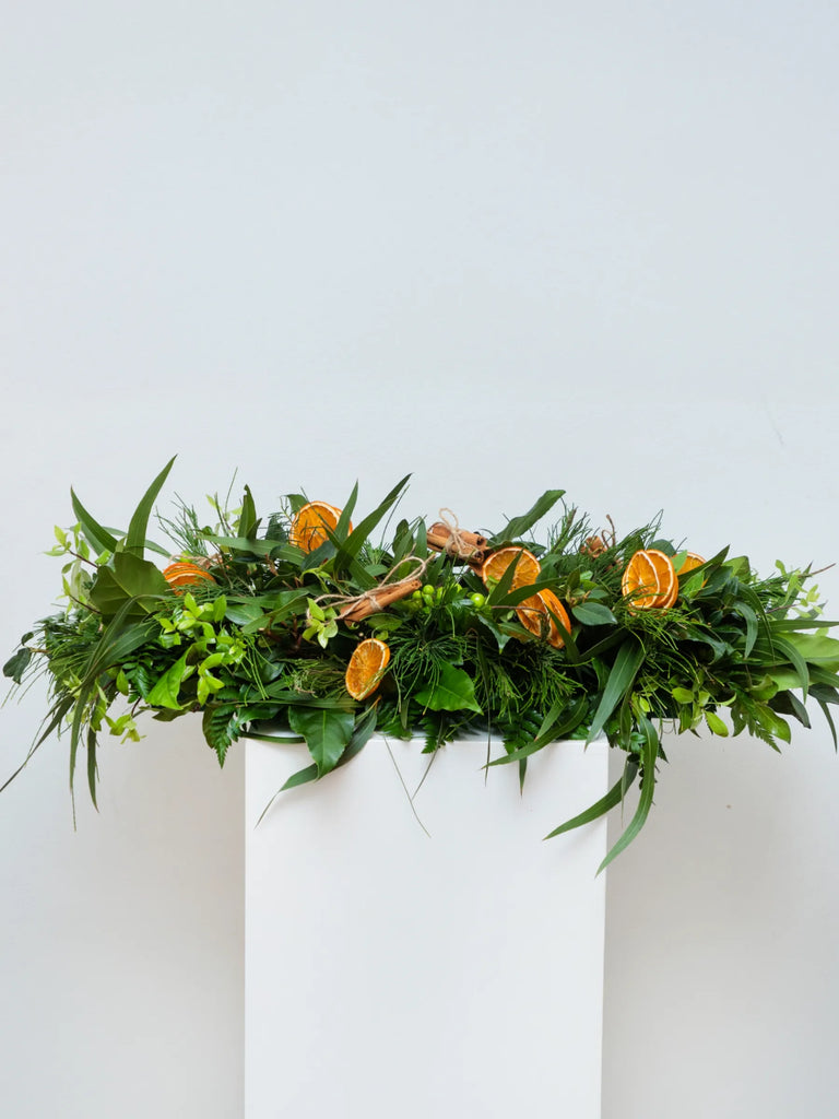 Rustic Christmas mantle garland featuring dried oranges, pine, eucalyptus and mixed greenery - natural evergreen swag for fireplace, doorway or table runne