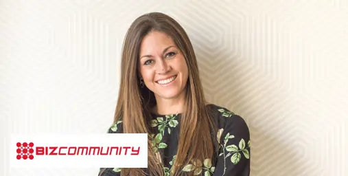 Woman with long brown hair smiling against a light background with Bizcommunity logo.