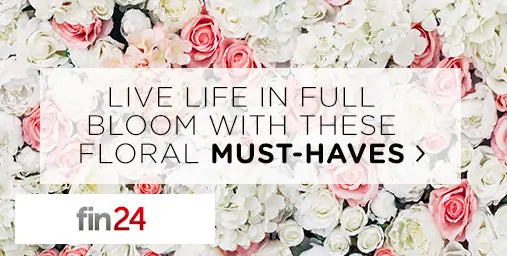Floral arrangement with text overlay 'Live life in full bloom with these floral must-haves' and 'fin24' logo.