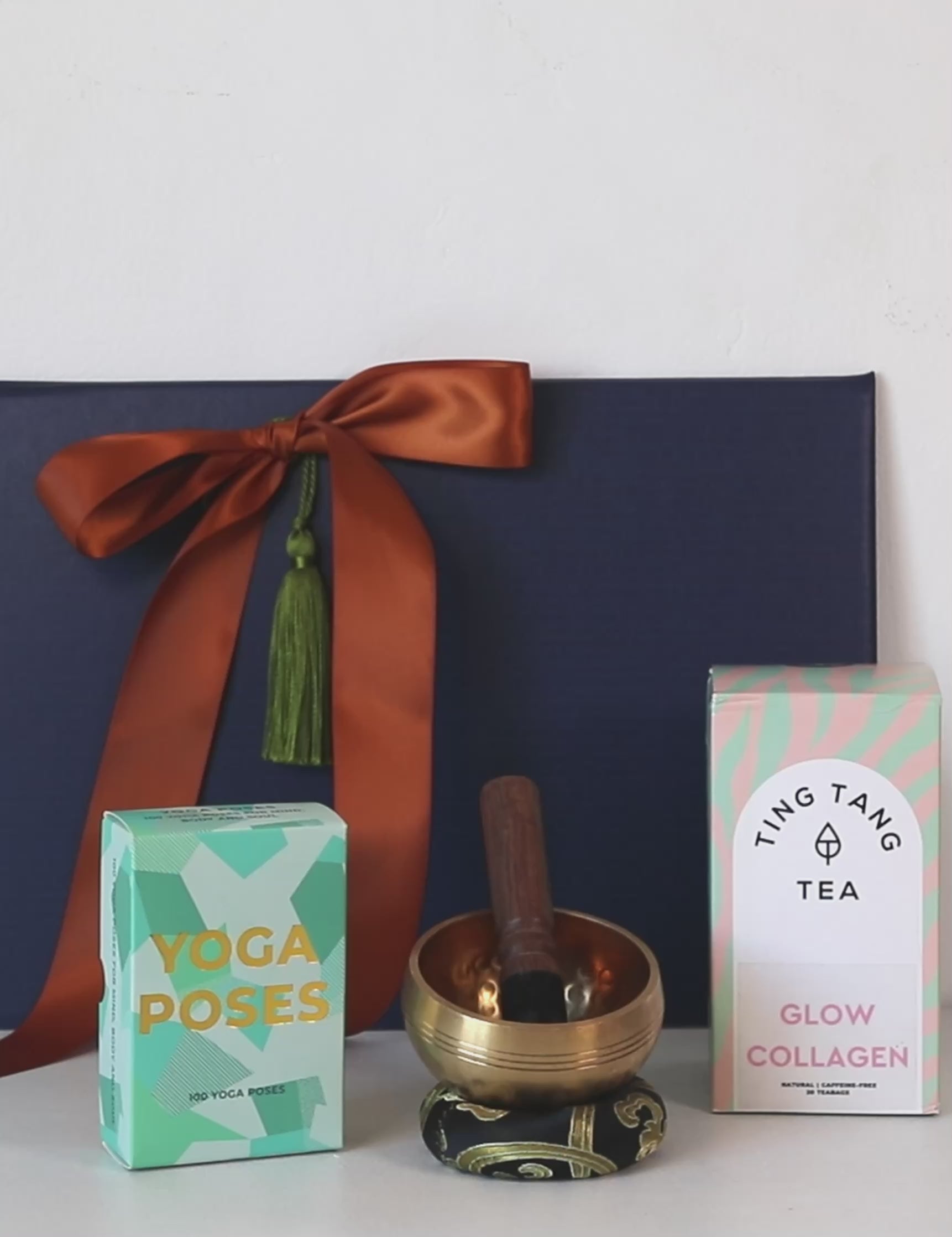 Yoga Serene Calm & Flow Gift Set with yoga poses cards, collagen tea, and meditation bowl, promoting mindfulness and relaxation.