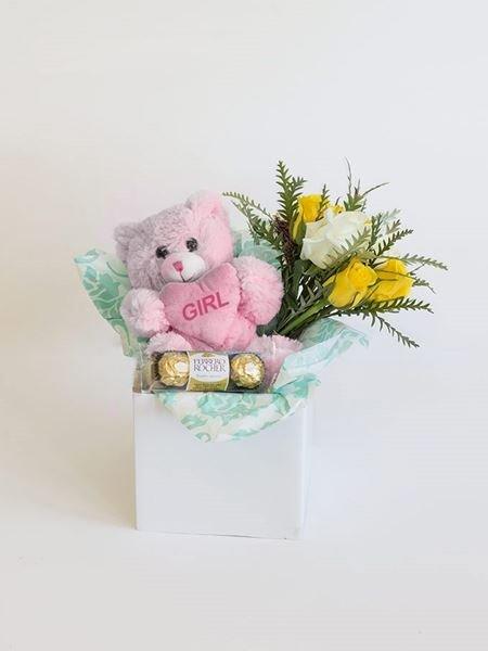 Celebrate a Baby Girl with Ferrero Rocher, teddy bear, and flowers in a decorative box, perfect for a special gift.