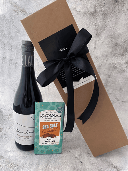 Choco-Cheers gift set with Lautus Non-Alcoholic Red Wine and chocolate slab, elegantly packed in a kraft box with a bow.