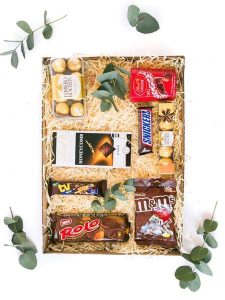 Chocolate Lover's Indulgence gift box with Ferrero Rocher, Lindt, Rolo, Snickers, TV Bar, and M&Ms, perfect for chocoholics.