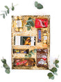 Chocolate Lover's Indulgence gift box with Ferrero Rocher, Lindt, Rolo, Snickers, TV Bar, and M&Ms, perfect for chocoholics.