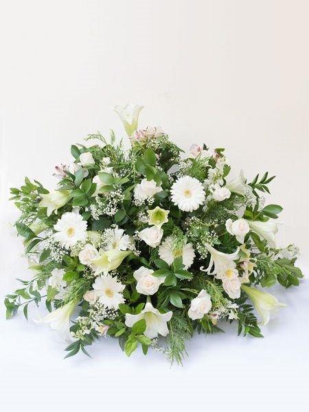 Flat Back Church Arrangement with white gerbera, St. Joseph lilies, white roses and greenery for the chapel or church.