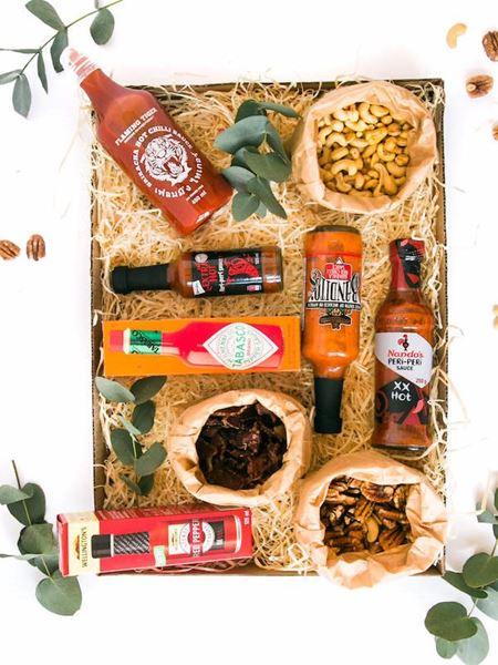 Hot Daddy gift box featuring hot sauces, luxury nuts, and biltong for the spicy man in your life.